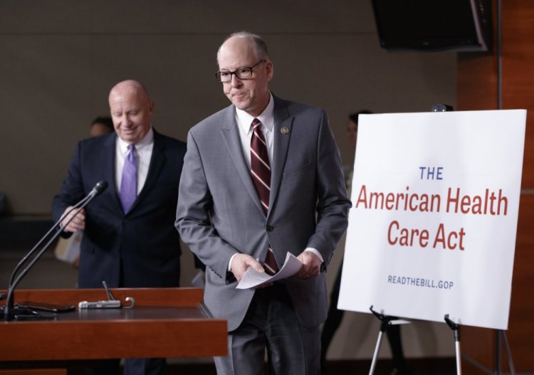 House Ways and Means Committee Chairman Rep. Kevin Brady, R-Texas, left, follows House Energy and Commerce Committee Chairman Rep. Greg Walden, R-Oregon, to a news conference on Capitol Hill in Washington on Tuesday as House Republicans introduce their plan to repeal and replace the Affordable Care Act.