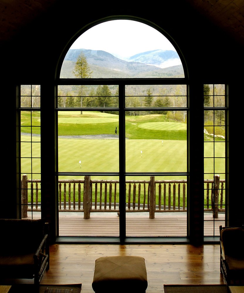 The clubhouse at the Sunday River Golf Club offers this view of the Mahoosuc Mountain range and the practice putting green. Construction of the course began in 2003 and was completed in 2005.