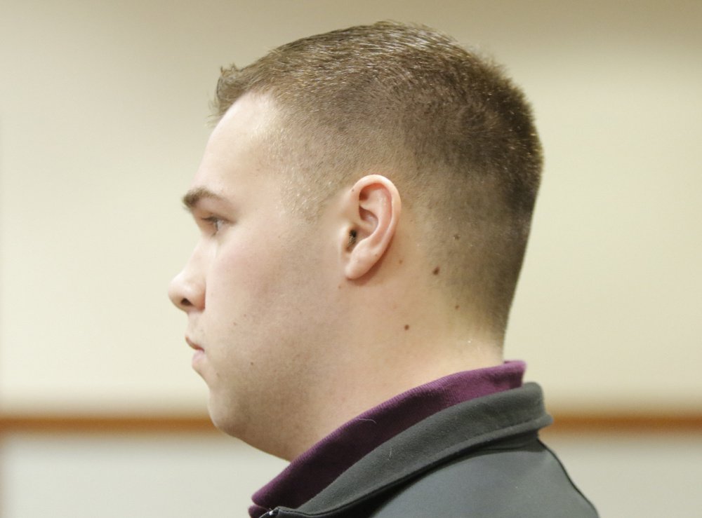 Nicholas Perry makes his initial court appearance in Portland on Wednesday. He is accused of having a sexual relationship with a student while he was cheerleading coach.