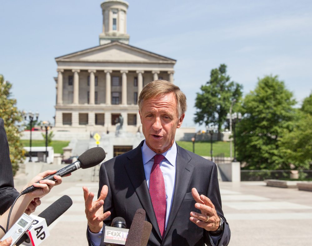 Gov. Bill Haslam speaks with reporters, in Nashville, Tenn., in 2014.