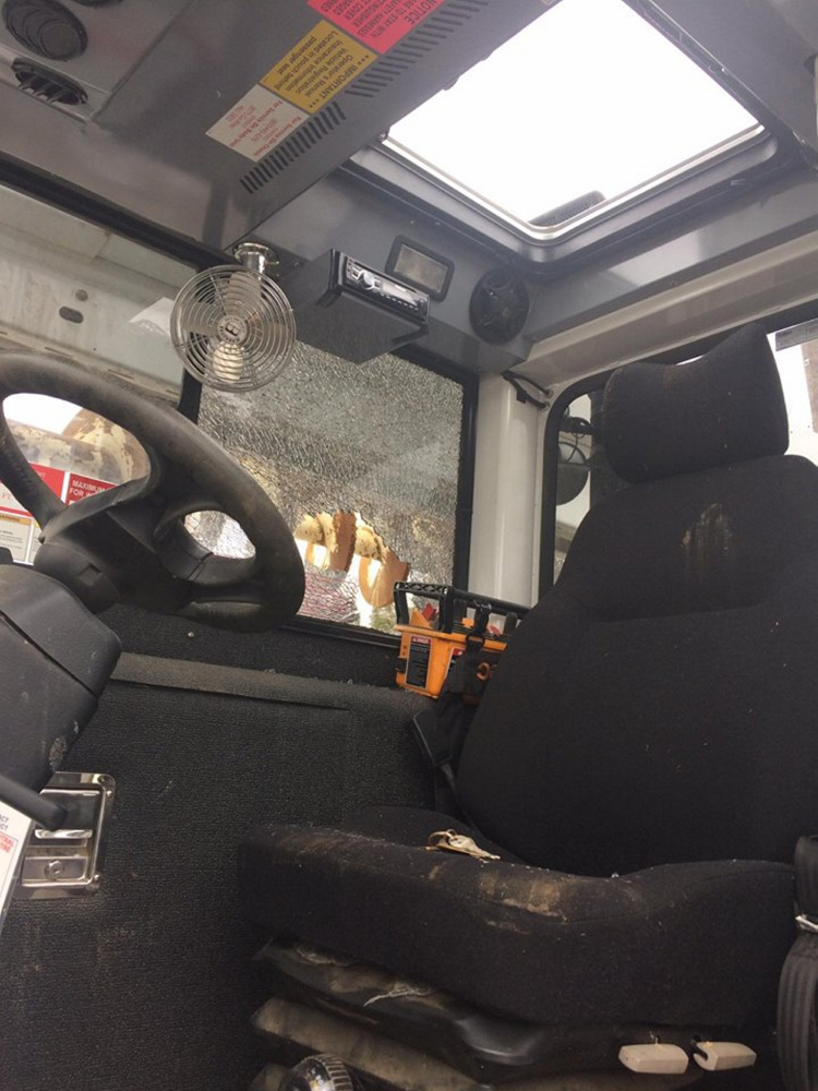 A Clinton Police Department photo shows vandalism reported to Central Maine Power Co. trucks that were parked off Route 23 near power lines.