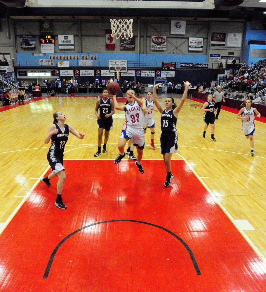 Messalonskee junior Ally Turner goes up for a layup during a Class A North semifinal Wednesday at the Augusta Civic Center.