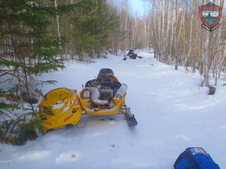 The Maine Warden Service released this photo of the snowmobile used by Thomas Henderson, 28, who died Friday after crashing in Carthage.