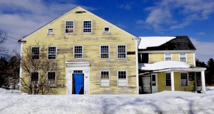 The town of Norridgewock plans to demolish this vacant house at 14 River Road because it has been deemed a safety hazard.