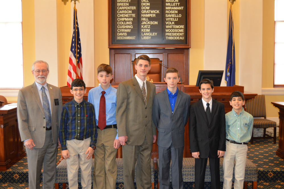 Sen. Rod Whittemore, R-Skowhegan,, left, with the Somerset Homeschool Co-op Robotics Team member seventh grader Jeremy Caruso, seventh grader Ashton Umbrianna, eighth grader Tregg Umbrianna, seventh grader Isaiah Simoneau, seventh grader Caleb Haynes and sixth grader Christopher Caruso. Missing from photo are seventh grader Carter Houle and fourth grader Sawyer Merrill.