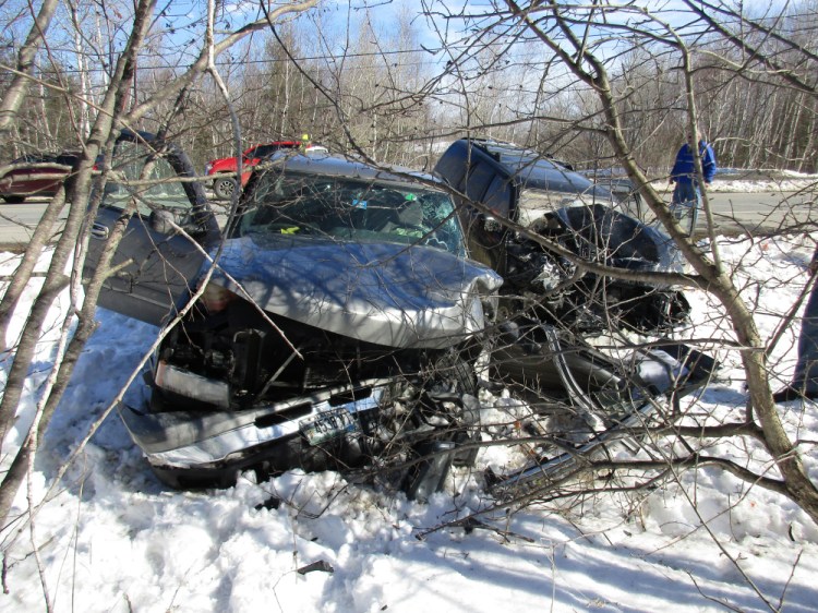 A 2007 Chevrolet pickup, left, and a 1998 Toyota SUV crash-landed together in a multi-vehicle accident Sunday afternoon in Newport, sending five people to area hospitals.