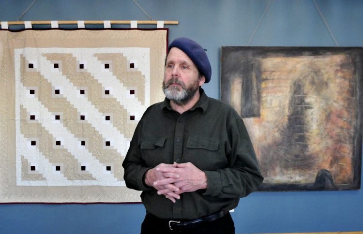 Artist and Waterville native Michael Libby discusses his art and project "On Getting High: Mapping Addiction at Home," on display Thursday at Thomas College in Waterville. The artwork is his response to the opiate crisis and impact on families, including his own after three of his siblings died in part because of their use of drugs or alcohol.