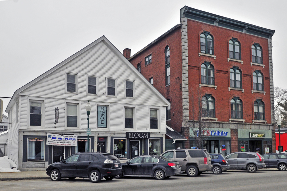 Kim Stoneton proposes to establish a shop to be called 8's Coffee Bar in the left side of the first floor of the wood-frame building, at left, that she owns at 130 Main St. in downtown Winthrop.