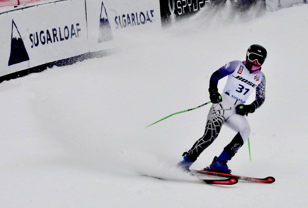 Colby College freshman Sandra Schoepke comes to a stop after finishing her race Monday at the U.S. Alpine Championships on Monday at Sugarloaf Mountain.