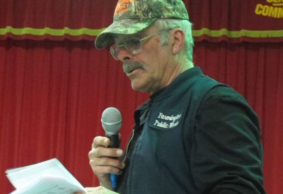 Jim Kiernan, Farmington's public works foreman, reads a statement to the assembled crowd at Monday night's Town Meeting.