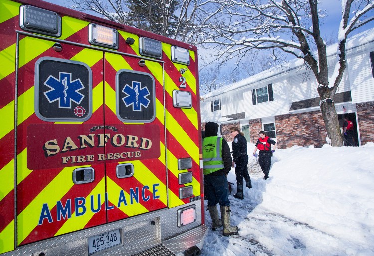 Paramedics respond tp Eastside Acres, a public housing complex on Bates Street in Sanford, where a resident allegedly overdosed on heroin in February. Neighbors called for emergency help twice that day for the same man, who awoke each time before paramedics arrived and refused any medical assistance. 