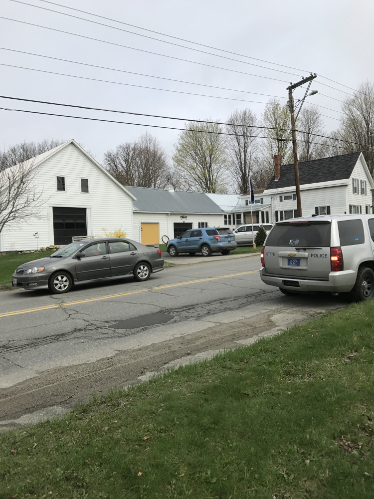 Police search the Benton Avenue area Friday morning. A final suspect in a string of car burglaries was caught there Friday morning.