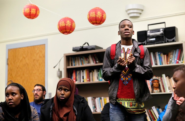 Jonathan Bobe, a sophomore nursing student at the University of Southern Maine, speaks during a discussion Wednesday about Islamaphobic graffiti found on the Portland campus.