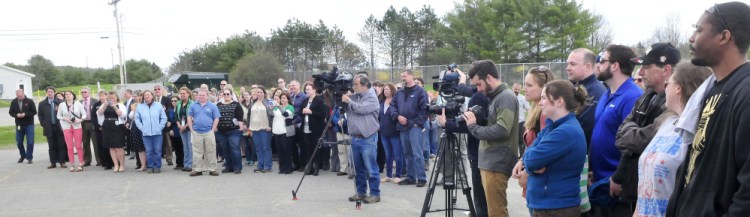 Elanco employees assemble for the opening of the company's new autogenous poultry vaccine facility Wednesday in Winslow.