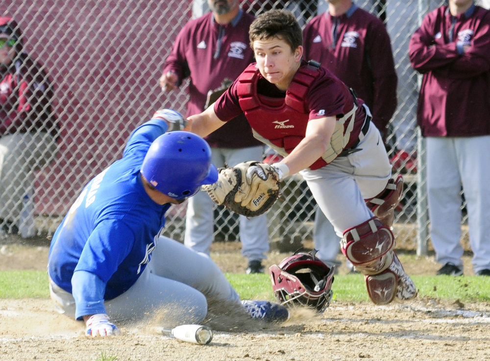 Richmond catcher Tristan Shea scrambles to tag Valley's Brandon Thomas but isn't in time Thursday in Richmond.