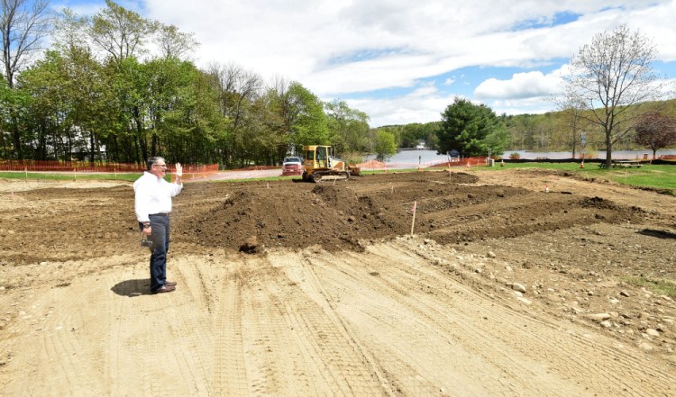 Oakland Town Manager Gary Bowman stands at the Messalonskee Lake boat launch during a ceremony for a new gazebo on Friday.