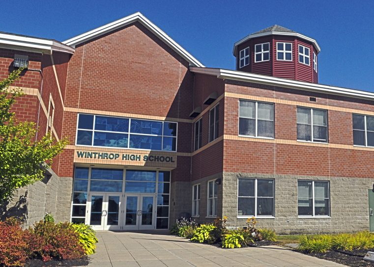 The front entrance is seen in photo taken on Sept. 17, 2014, at Winthrop High School. Parents are worried about cuts to music and sports in the upcoming budget.