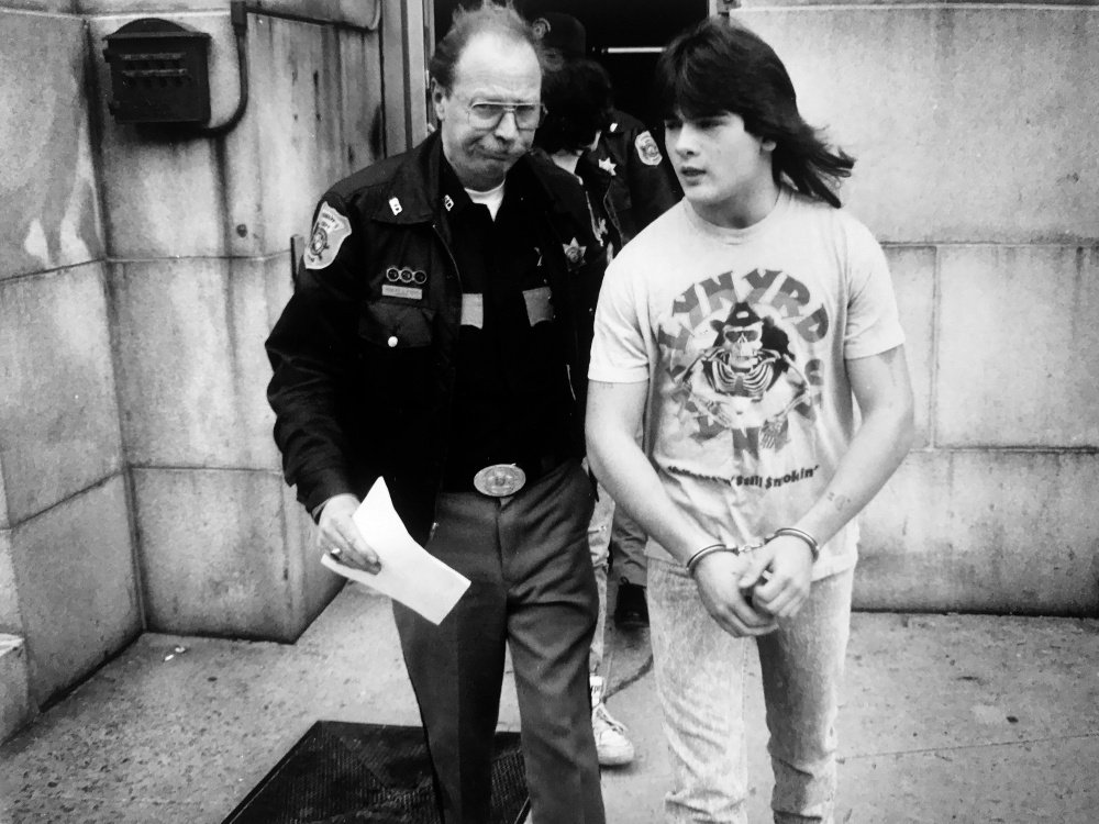 PORTLAND, ME - APRIL 19: Anthony Sanborn is led from Cumberland County Courthouse while waiting to be arraigned for murder of Jessie Briggs April 19, 1990. (Photo by Jack Milton/Staff Photographer)