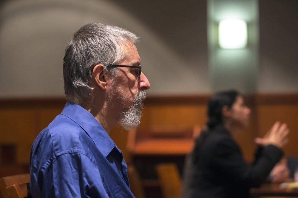 Burton Hagar sits at the defense table Friday during a bail heraing at the Cumberland County Courthouse. Hagar is accused of killing his infant son 38 years ago. The death was originally thought to be Sudden Infant Death Syndrome, but the case was reopened after many years of Hagar allegedly telling friends and family members that he suffocated the child with a pillow. Hagar was granted $10,000 bail with a $100,000 surety. Assistant Attorney General Lara Nomani, who is the prosecutor for Maine's cold case division, is in the background.