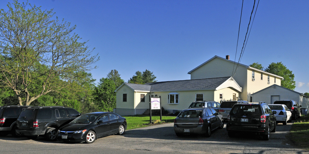 Cars fill the driveway and line the side of Outer Central Street on Thursday at Vicki's School of Dance in Hallowell. Vicki Gilbert has been running the business for 40 years in a home studio.