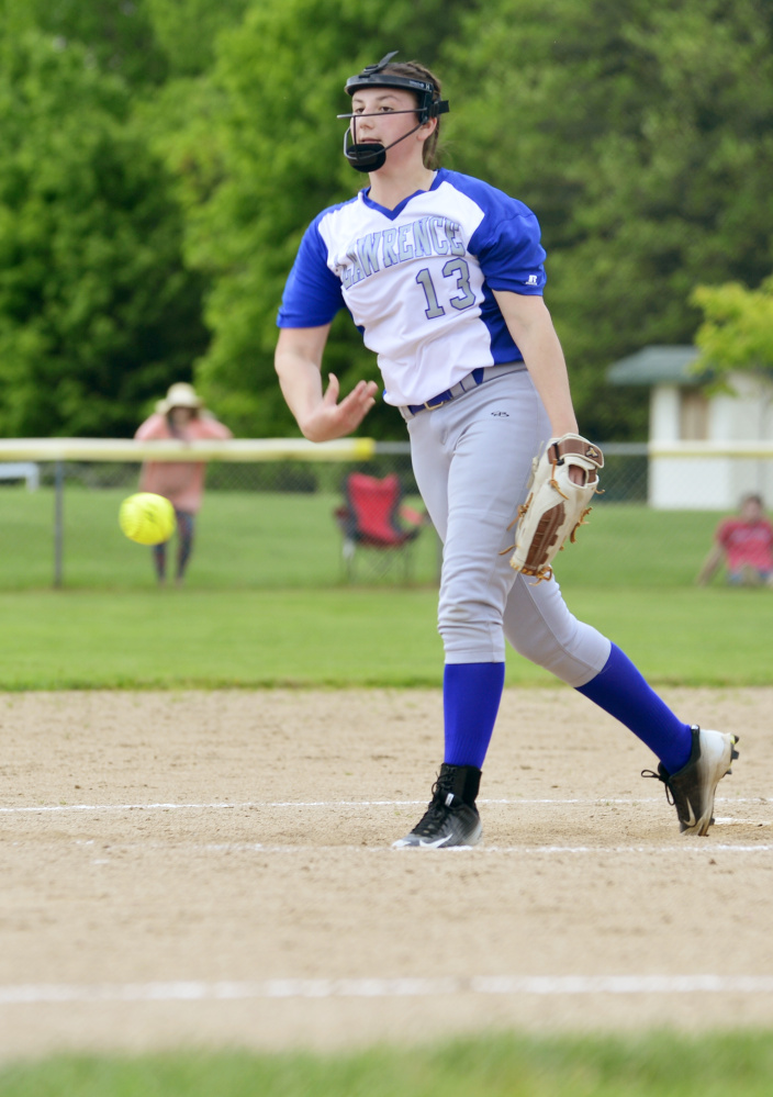 Lawrence pitcher Lilly Herrin delivers to an Oxford Hills hitter during a Class A North semifinal game Saturday in South Paris.