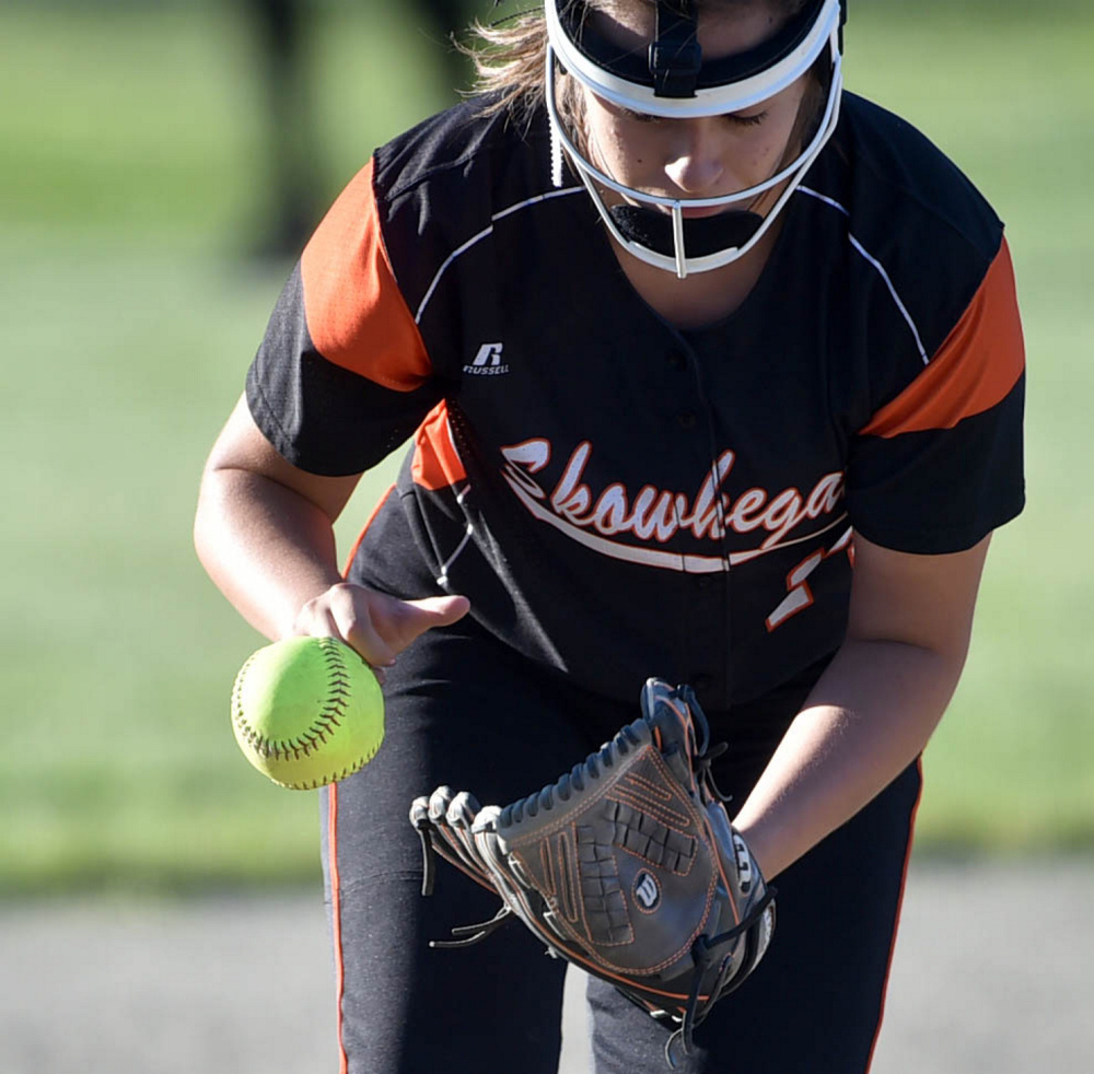 Skowhegan's Lindsey Warren tries to get a hold of a grounder during the Class A North title game Wednesday night in Augusta.