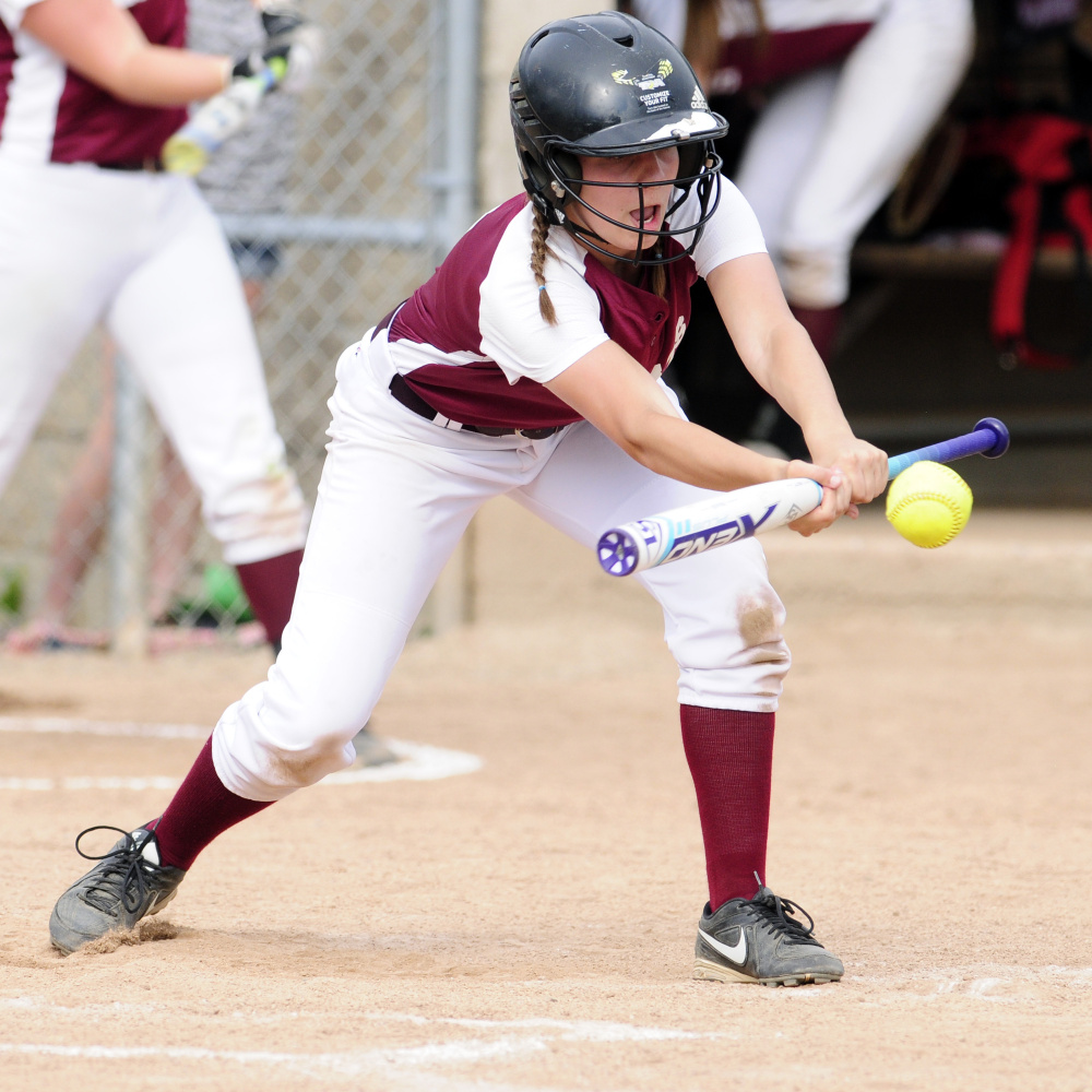 Staff photo by Joe Phelan
Richmond shortstop Caitlin Kendrick tries to get a bunt down during the Class D South regional final Tuesday at St. Joseph's College in Standish.