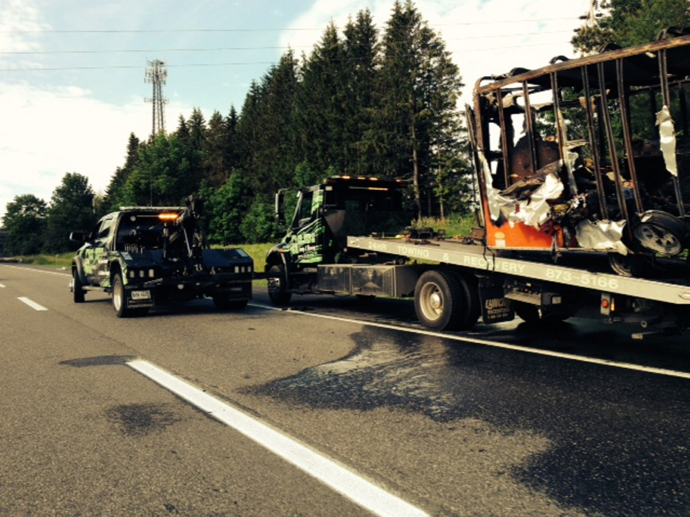 A mover's 8-foot utility trailer full of furniture and clothes caught on fire around 7 a.m. and was destroyed along with a stretch of pavement on Interstate 95 and a Department of Transportation sign. While the cause is undetermined, the fire appears to have started in the axle.