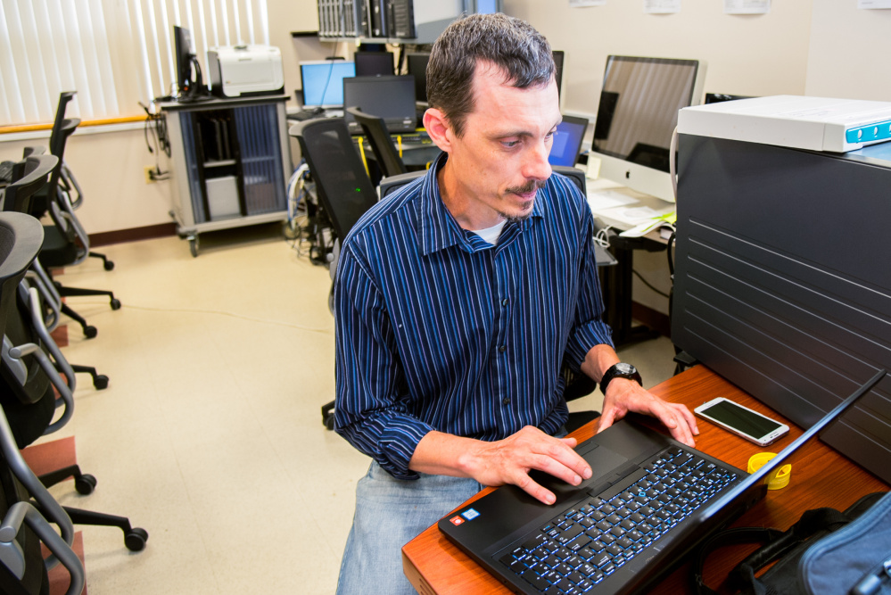 Robert Thompson, a University of Maine at Augusta student, works on a project Friday in the cybersecurity laboratory on campus in Augusta.