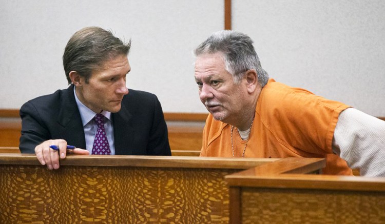 Theodore Thomes confers with his attorney, Devens Hamlen, during a bail hearing on May 16, 2017, at the Cumberland County Courthouse in Portland.