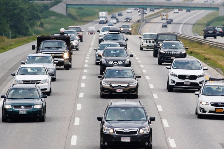 Holiday travelers hit the road heading north in Scarborough on Friday. A high volume of traffic is expected this July 4th.