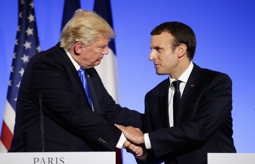 Associated Press/Markus Schreiber
President Trump and French President Emmanuel Macron end a news conference Thursday in Paris. The two met to discuss the crisis in Syria and counterterrorism strategies.