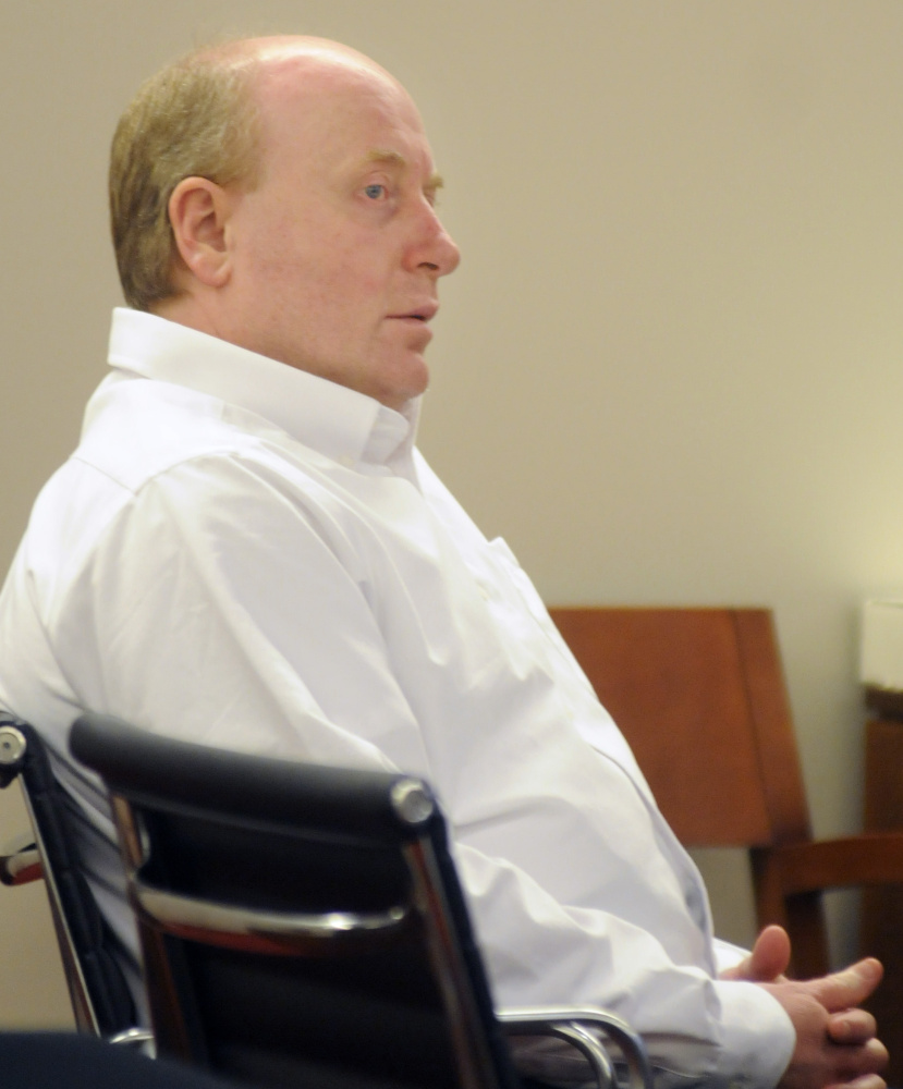 Roland L. Cummings listens Nov. 18, 2015, during his trial in Augusta as state prosecutors summarize their case against him for the murder of 92-year-old Aurele Fecteau in Waterville.