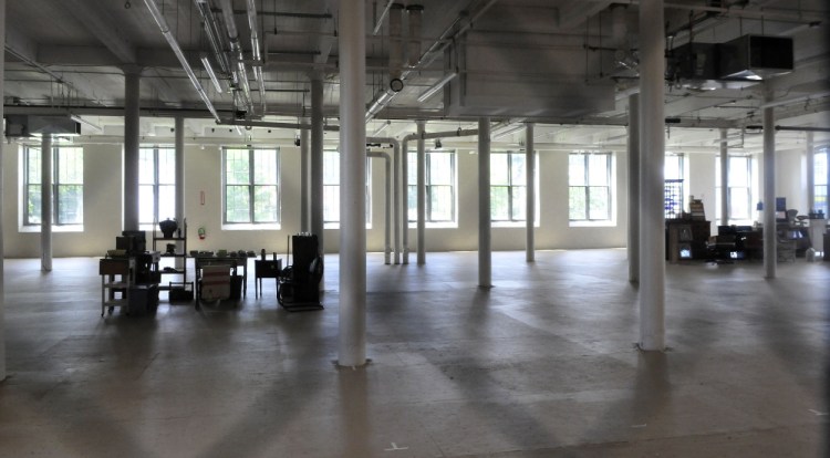 The interior of the Hathaway Creative Center in Waterville on Monday, where antique dealers involved with Hathaway Mill Antiques have begun to move their wares.