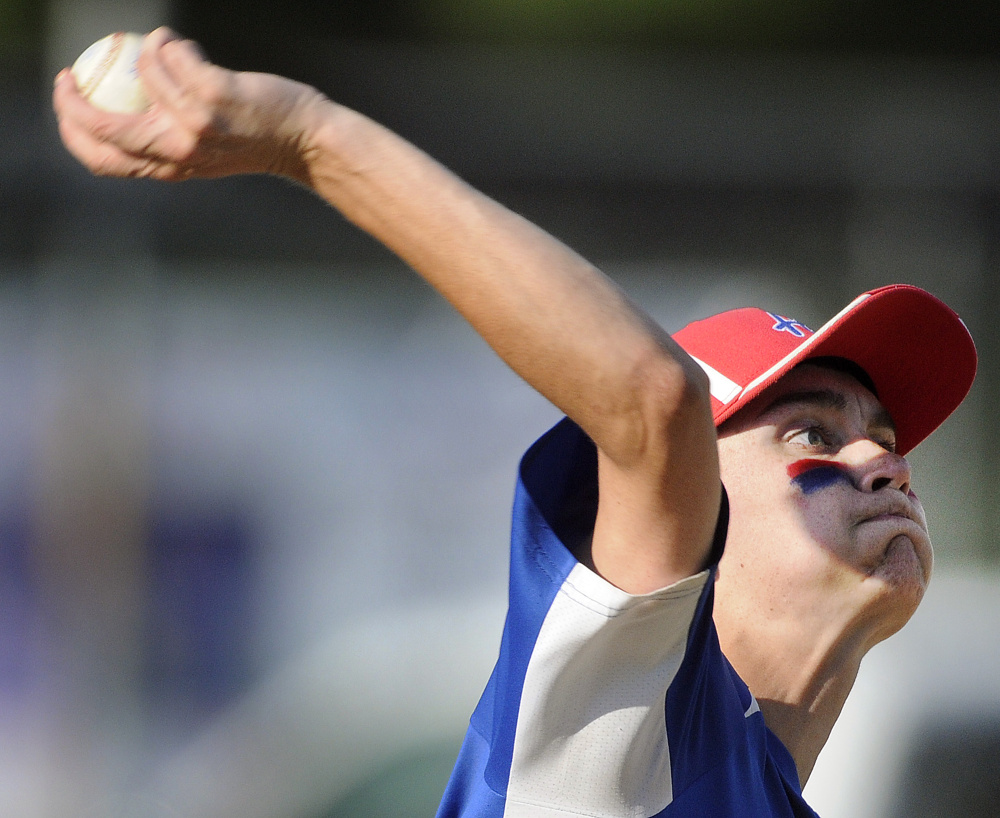 Augusta's Logan Dupont throws a strike during the Babe Ruth 14U state championship game against Tri-County on Monday in Augusta.