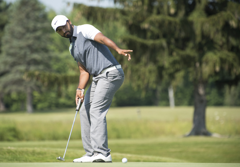 Rocky Khara of Sebring, Florida talks his ball in the direction of the hole at Bangor Municipal Golf Course on Friday.