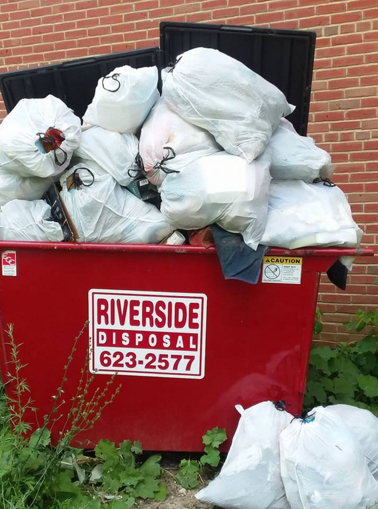 Summit Medical Marijuana owner Dennis Meehan said dozens of people participated in a Saturday event that promised a gram of marijuana for every trash bag picked up.