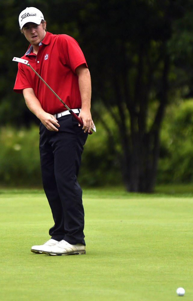 Staff photo by Andy Molloy
Ben Leet, of Augusta, watches a putt during the first round of the Maine Open on Monday in Manchester.