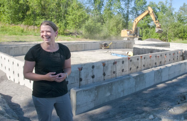 Dr. Susan Bailey talks Friday about her new office for Porchside Veterinary Care being built in Dresden.