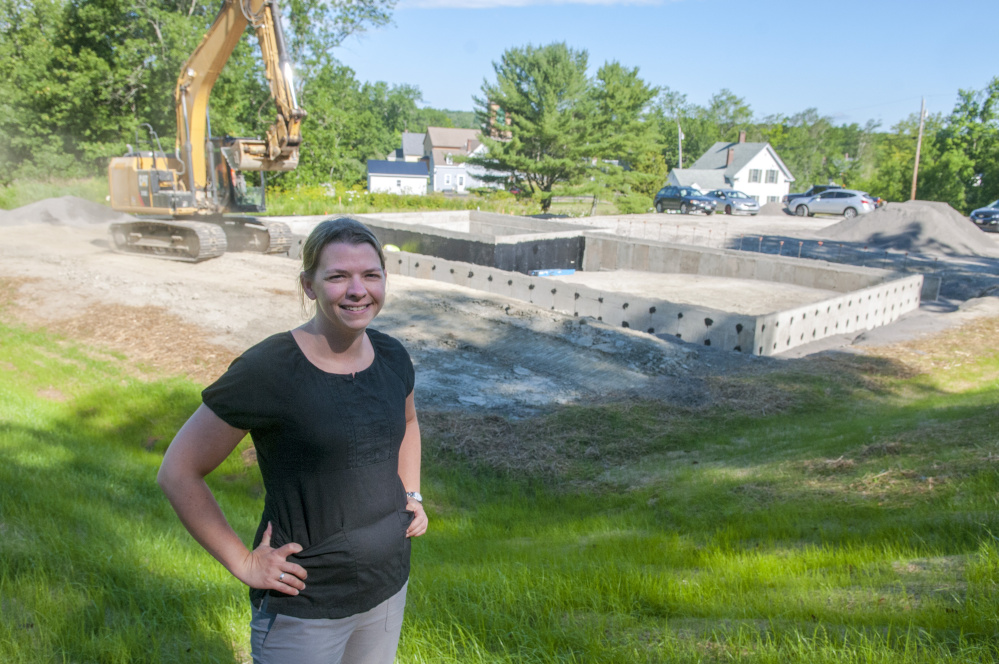 Dr. Susan Bailey talks Friday about her new office for Porchside Veterinary Care being built in Dresden.