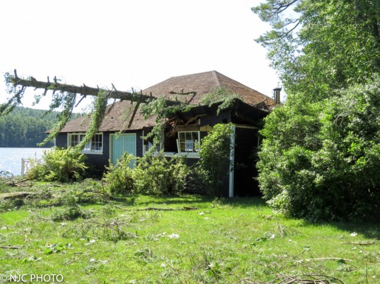 One of Saturday's five tornadoes left this damage on Moose Pond in Denmark. It "all happened in less than a minute," said Nancy Campbell.