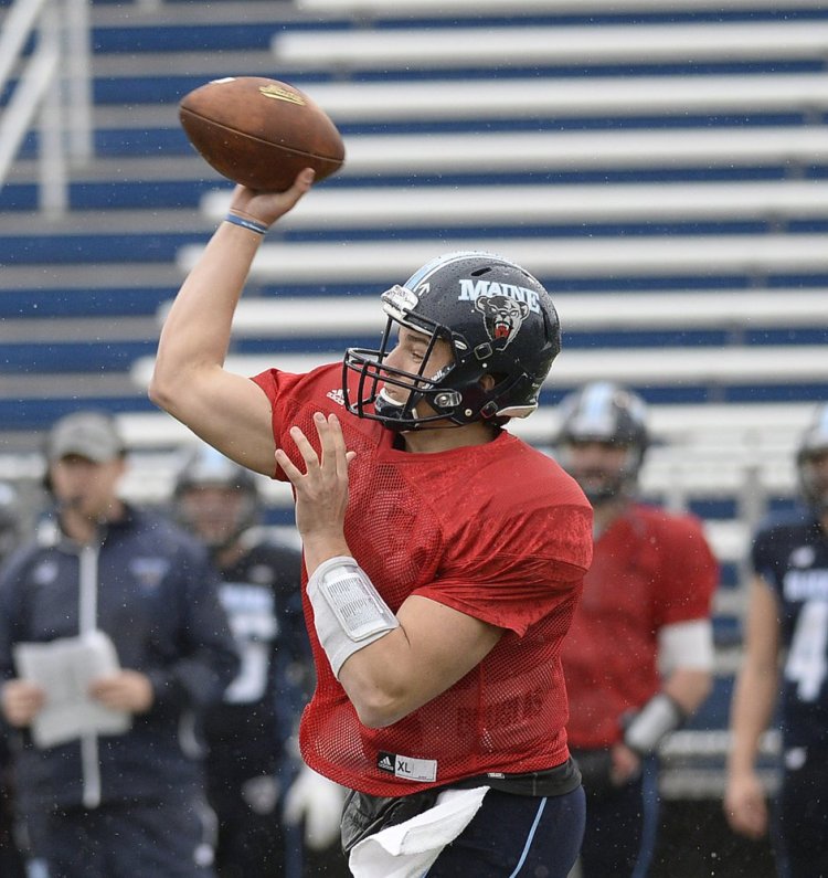 University of Maine quarterback Christopher Ferguson throws a pass.