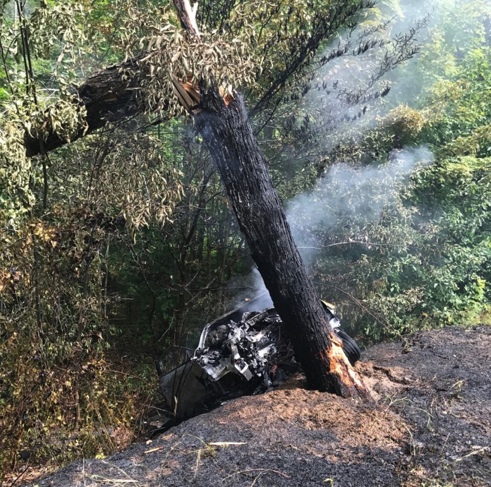 Joseph Parent of Portland spotted this smoky wreck on Route 25 in Limington last August. He was honored at the Maine Chiefs of Police Association banquet for helping to rescue the woman trapped inside the vehicle.
