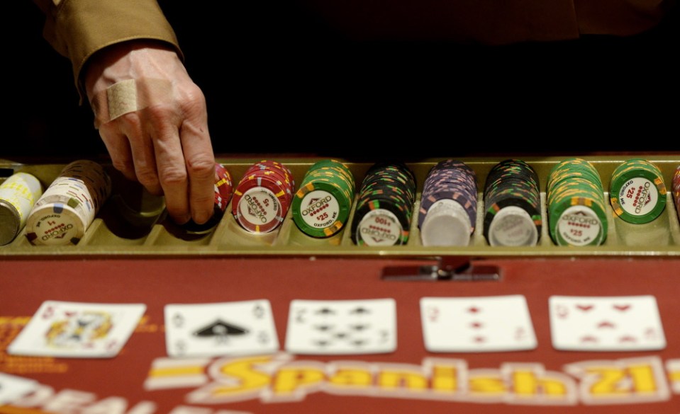 A dealer hands out chips at Oxford Casino in 2013. Maine voters are slated to vote this fall on a referendum to open a York County casino that could be licensed only to Las Vegas developer Shawn Scott; that license is worth an estimated $150 million.