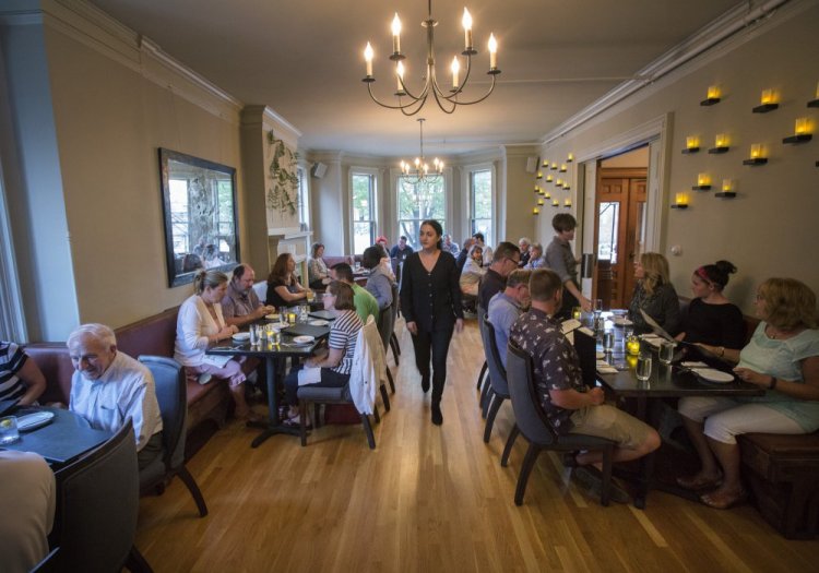 The new Roma Cafe that opened several weeks ago embraces the legacy of the old Italian-American restaurant established in 1924 near Monument Square.