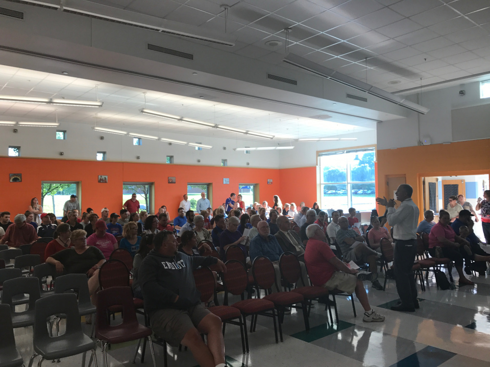 Superintendant Carl Gartley lays down the rules for the audience Wednesday at Messalonskee Middle School before opening up discussion on the proposed $3.9 million athletic complex in Oakland.