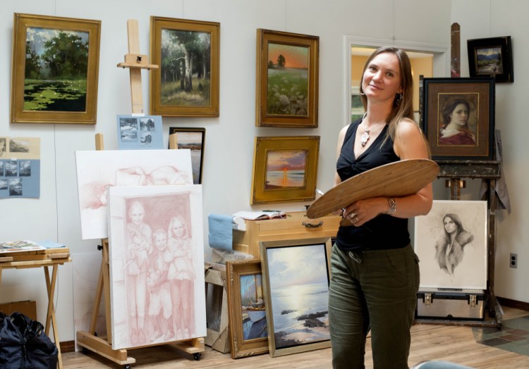 Olena Babak, a native of Ukraine and a Hartland artist, stands in her studio Saturday as she takes part in the Wesserunsett Arts Council's Open Studio Tour.