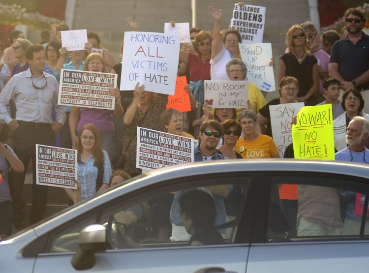 A crowd gathers during a rally Monday on the State House steps in Augusta to express support for Charlottesville, Virginia, and oppose the white supremacists who staged a protest there on Saturday.