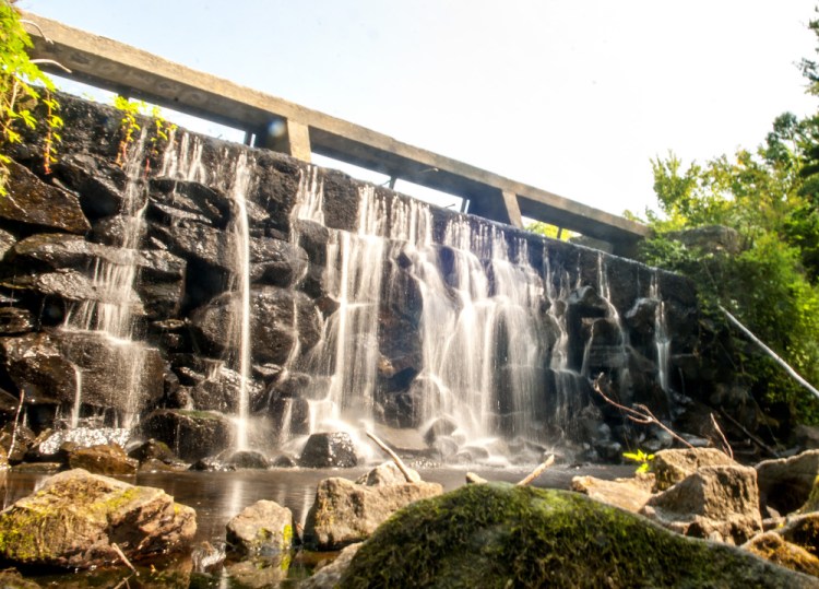 The dam at the south end of Lower Togus Pond, shown on Tuesday, may one day be the site of a fishway to help alewives get in to Togus Pond.