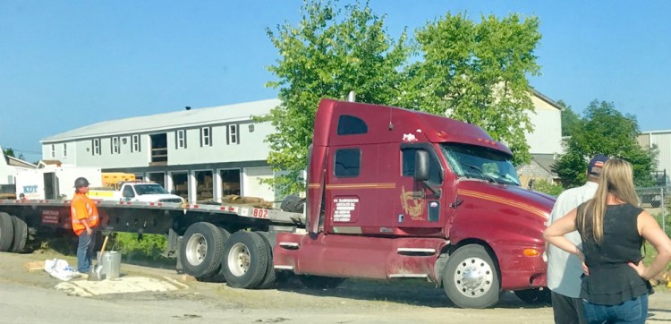 A tractor-trailer rolled over on Route 3 in Augusta on Thursday morning, in a ditch by Lapointe Lumber.